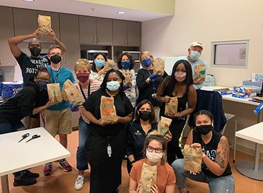 The Johns Hopkins Home Care Group shows off their Bunches of Lunches. 