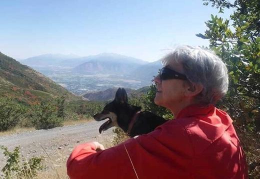 Jane on a hike with her dog